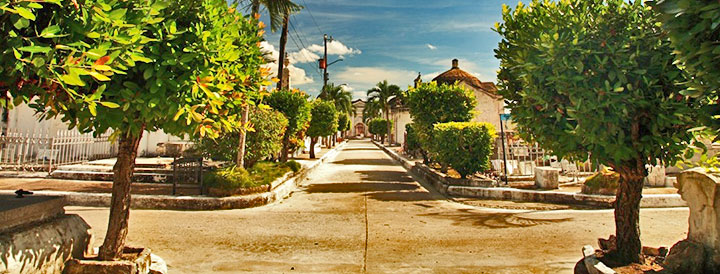 The city cemetery •]• A view of a Santa Lucia beach at sunset